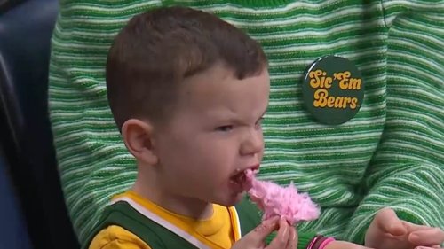 Young Baylor fan goes viral as he works his way through snacks during March Madness action... but...