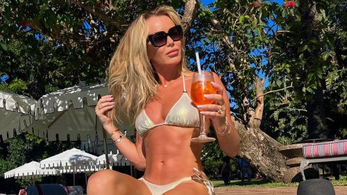 Amanda Holden, 54, reveals she attended her daughter's parents' evening in a swimsuit with a glass of wine