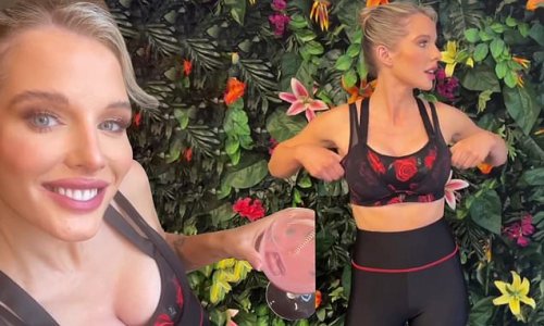 Helen Flanagan showcases the results of her breast augmentation surgery in a crop top as she attends a sportswear event in London