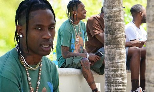 Travis Scott hangs out with friends in Miami ahead of performance... after his first festival since Astroworld tragedy is canceled