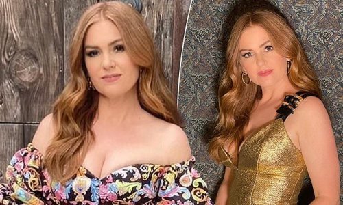 Isla Fisher shows off her ageless visage and stuns in a low-cut dress