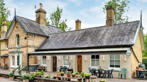 Inside a train station-turned home with carriages for rooms that has hit the market with a £975,000 price tag
