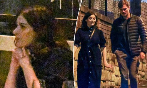 Nigella Lawson, 62, can't wipe the smile off her face as she heads out for dinner in Sydney with a male friend