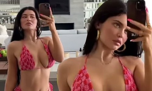 Kylie Jenner flaunts her curves in a pink string bikini