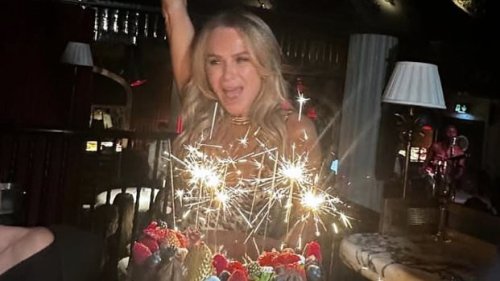 Amanda Holden, 54, beams as she enjoys VERY belated birthday celebrations with her pals - days after revealing she shared a bath with her dog