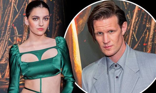 House of the Dragon star Emily Carey stuns in a racy green cut-out dress as she joins a dapper Matt Smith at the Game of Thrones prequel's European premiere in Amsterdam