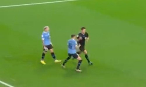 Ref rage: Uruguayan star Federico Valverde charges towards official Daniel Siebert in celebration after Ghana’s missed penalty but somehow avoids a yellow card