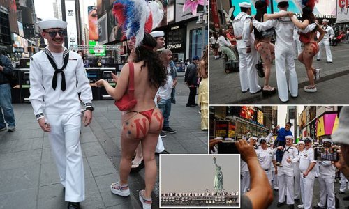 Ahoy sailor! Thousands of servicemen hit Times Square to celebrate Fleet Week and pose up a storm with nude performers at Crossroads of the World