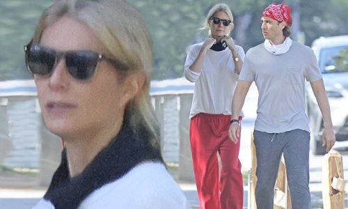 Gwyneth Paltrow wears red sweatpants on a walk with Brad Falchuk