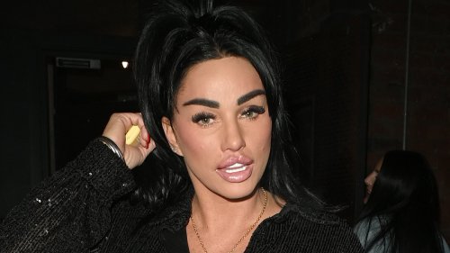 Katie Price slips into skin-tight leather trousers and sports a bandaged foot at a beauty bash in...