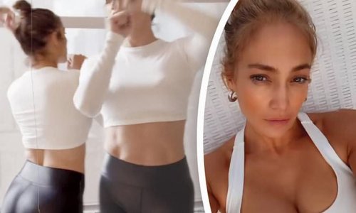 Jennifer Lopez, 52, shows off her incredibly toned tummy