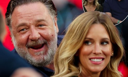 Russell Crowe, 57, makes a rare public appearance with his glamorous girlfriend Britney Theriot, 31, as he watches Ash Barty match at the Australian Open in Melbourne
