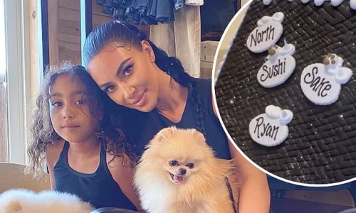 She still has the dogs! Kim Kardashian reveals Sushi and Sake have not gone anywhere as their names appear on Christmas house... though they are hardly ever seen