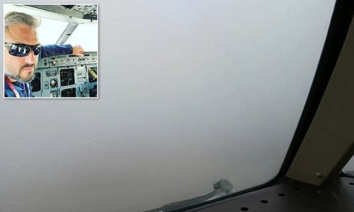 Airline pilots film their jet landing in heavy cloud