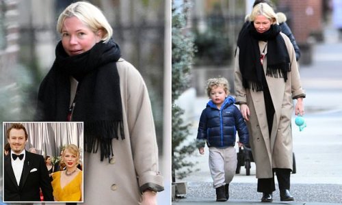 Michelle Williams takes a walk in New York City with son Hart, two, after earning Oscar nod for The Fabelmans just days after 15th anniversary of ex Heath Ledger's death