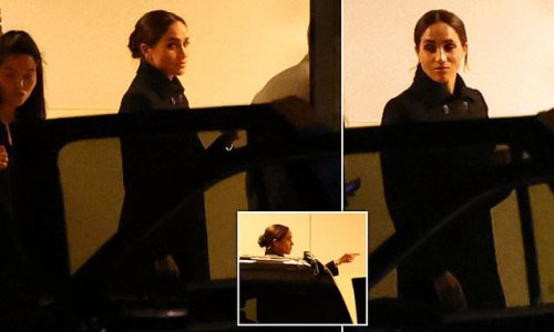 Meghan Markle is pictured leaving hotel in the U.S. where she was guest speaker at 'power of women' charity event hours after British ex-counter terror chief revealed she faced 'very real' threats to her life in the UK
