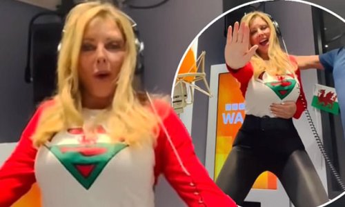 That's one way to cheer them on! Carol Vorderman sports a Wales jersey and skintight leather trousers as she gets her groove on ahead of rugby game