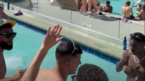 Inside Leeds' Vegas promotion party: Former Man United star leads the celebrations with bikini-clad hosts - and giant cut-outs of players' faces!