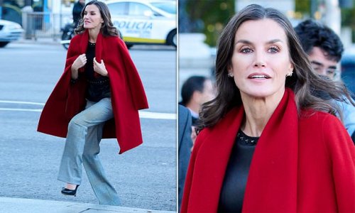 No objection here! Queen Letizia stuns in a recycled Boss crimson coat and leather top as she attends 10th summit of Women Jurists in Madrid