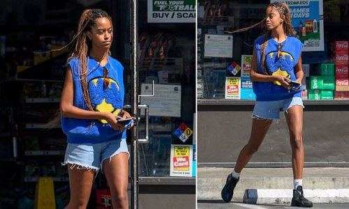 EXCLUSIVE: Legs for days! Malia Obama shows off her toned limbs in tiny cut-off jean shorts and sleeveless sweater vest as she picks up some snacks at 7-Eleven