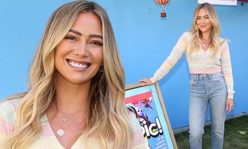 Hilary Duff puts her eye for style on display in colorful sweater and high waist jeans as she reads to children at benefit event in LA