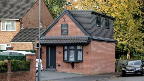 The man who built a two-storey HOUSE on his driveway: How family waged war with council over illegal home... but three years later who won?
