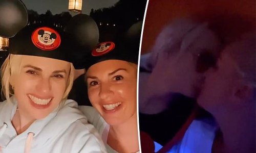 Rebel Wilson and girlfriend Ramona Agruma share a sweet smooch as they enjoy a date night at Disneyland