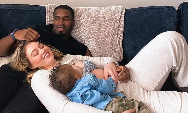'Finally finding peace in the chaos': Iskra Lawrence nurses her son while cosying up to boyfriend Philip Payne in sweet snap as she candidly details her breastfeeding journey | Flipboard