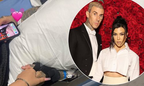Revealed: Travis Barker, 46, was 'hospitalized for pancreatitis' after undergoing colonoscopy... as he remains under medical care with wife Kourtney Kardashian by his side in LA