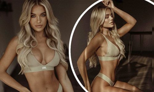 Molly Smith poses up a storm in nude lingerie set