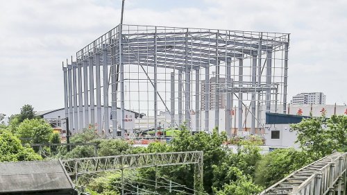 Fury at 'eyesore' 200ft tall Chinese supermarket warehouse towering over housing estate - as locals insist it keeps getting BIGGER every time they open their doors