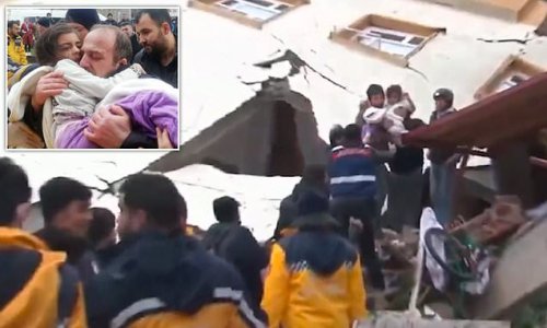'I'm fine, dad!' Brave five-year-old's words to emotional father as the child is pulled from the rubble of a six-storey building after seven hours in Syria