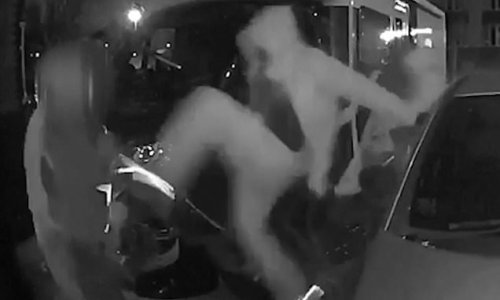 Shocking moment thug fly-kicks pensioner as he defends his home
