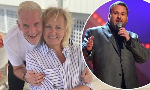 I'm A Celebrity's Chris Moyles and Sue Cleaver show off their slimmed-down frames as they pose for snap in final - after DJ claimed he lost 1.5st in jungle