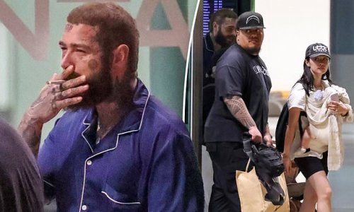 Post Malone smokes a cigarette in expensive silk pyjamas as he touches ...