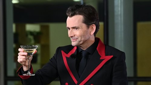 Finally, the new 'Bond' is revealed! Former Dr Who star David Tennant cuts a dapper figure and sips...