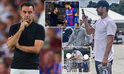 Business or pleasure, Gerard? Barcelona defender Pique is seen carrying a Chelsea bag during a visit to Wimbledon... after being told he has no future at the Nou Camp by former team-mate Xavi