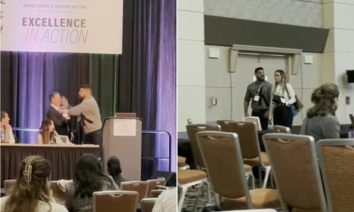 'You know what you did': Baltimore science conference descends into chaos after furious husband storms on stage and SLAPS doctor for 'sexually assaulting his wife seven years ago'
