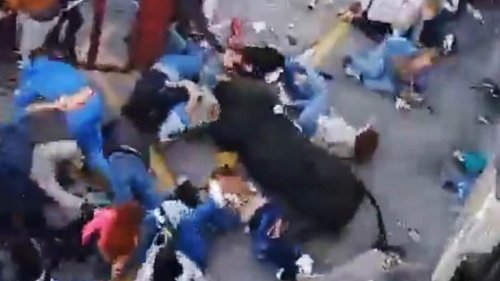 Shocking moment bull smashes into children at Easter festival after crashing through flimsy barrier and goring the crowd