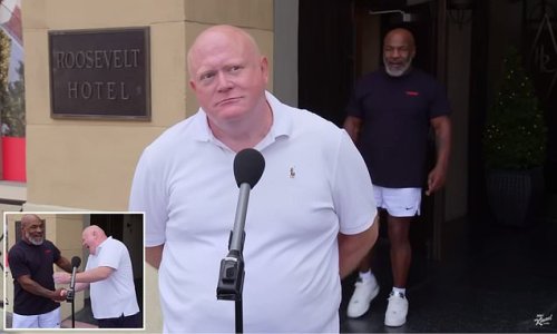 Hilarious moment Aussie man says he thinks he could fight Mike Tyson - only for the heavyweight legend to show up RIGHT BEHIND HIM