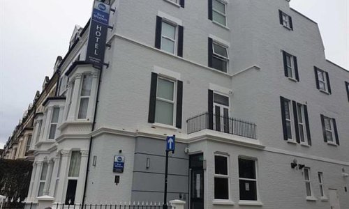 Dozens of migrants are living in a hotel close to Kensington Palace