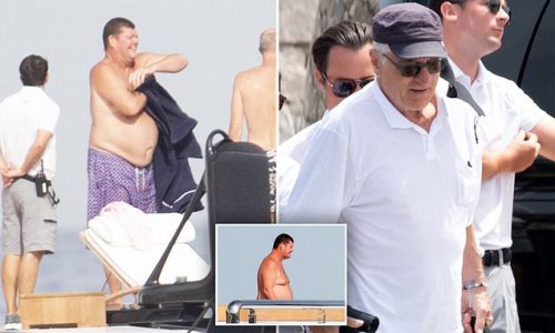Billionaire James Packer is joined by Hollywood star Robert De Niro as he enjoys a swim off his $200M superyacht in Sardinia
