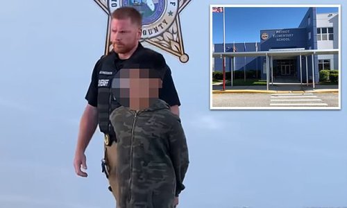 Florida student, TEN, is arrested for 'sending text message threatening  mass shooting at his elementary school' and is led away in handcuffs just  five days after 19 students and two teachers were