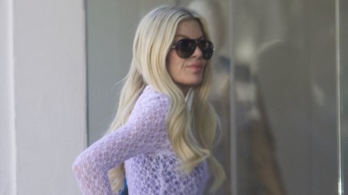 EXCLUSIVE: Tori Spelling shows off svelte frame in crop-top during outing in LA - as somber star is...