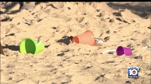 Distressing moment frantic rescuers try to dig dying girl, 5, out of collapsed sand hole she was...