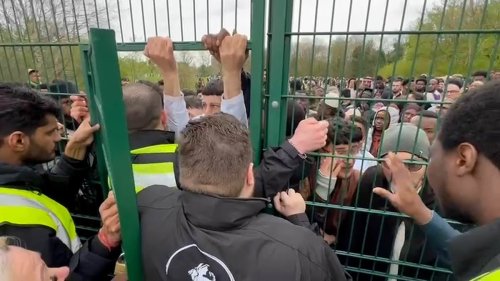 Tempers flare as thousands of Muslims queue for Eid prayers at Manchester sports centre - after...
