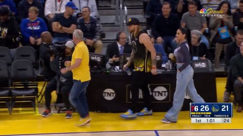 George Kittle and his wife Claire are given a rapturous reception as they turn up courtside for...