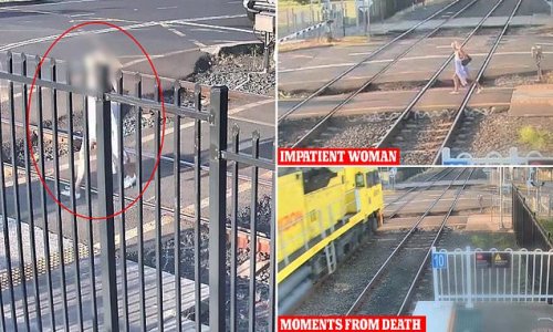 Woman escapes death by two seconds as freight train approaches