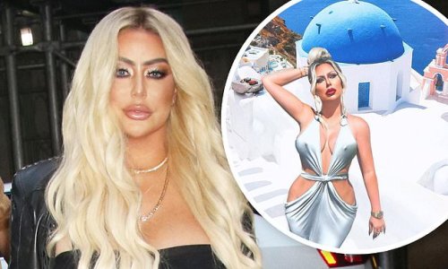 Aubrey O'Day sets the record straight on why she photoshops herself into exotic locations on Instagram: 'I'm making art'
