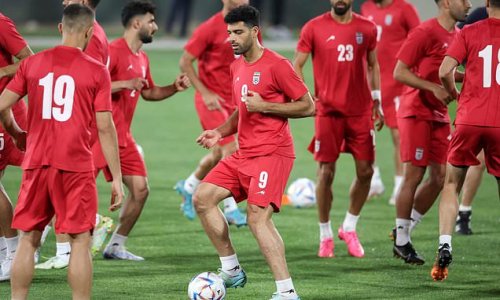 Families of Iran's World Cup team 'are threatened with IMPRISONMENT and TORTURE if the players do not sing the national anthem before USA clash or if they protest against Tehran regime'